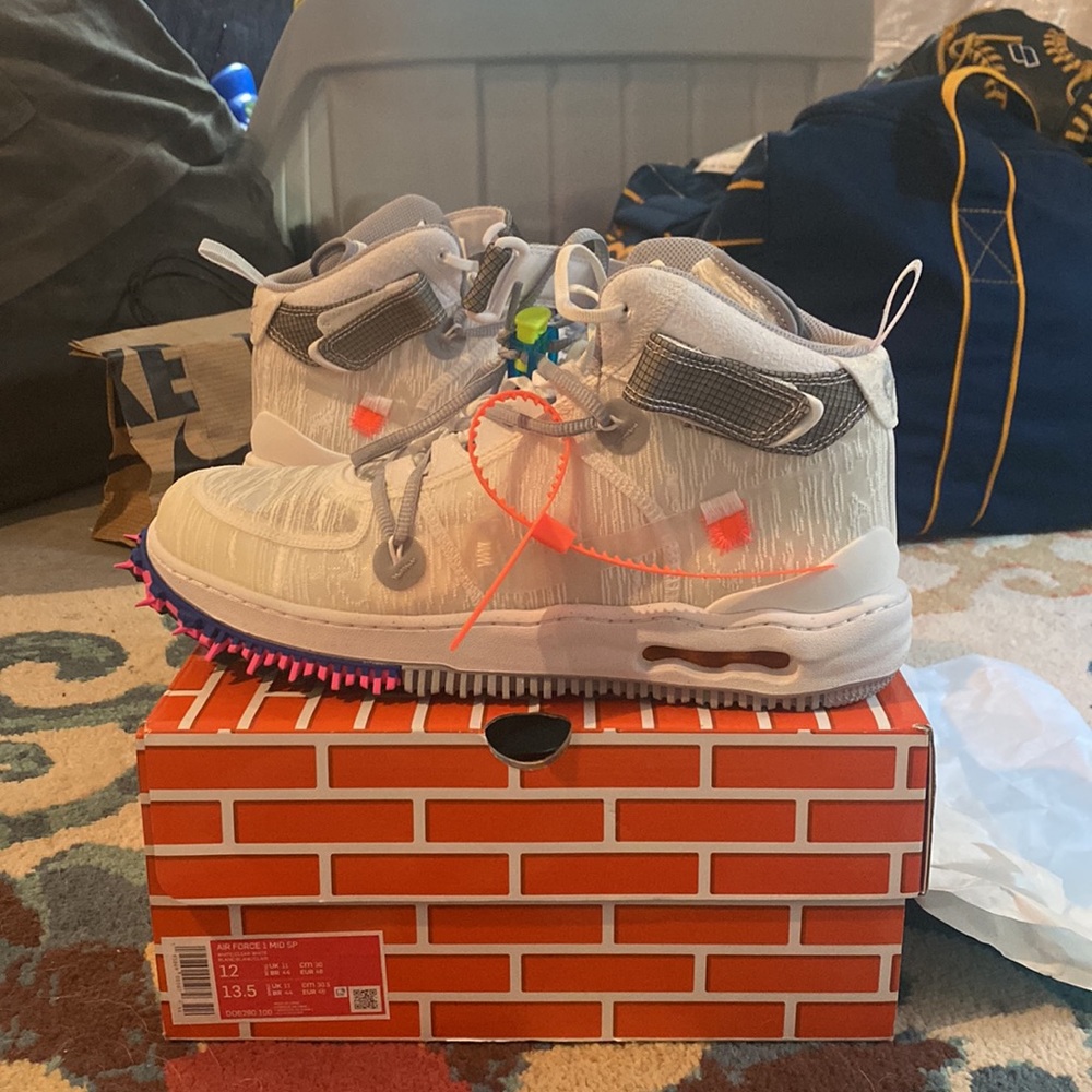 Off-White Air Force One Mid exclusive drop. Never been worn. Very unique.